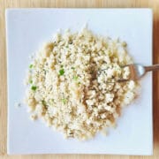 Steamed fonio on a square plate