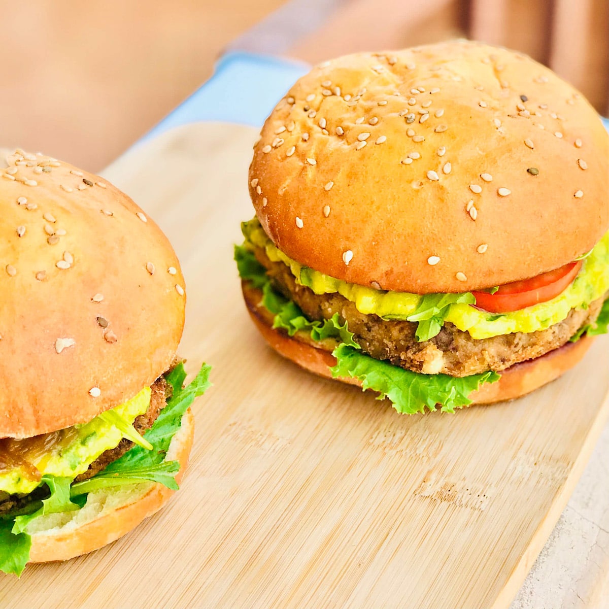 Bambara bean burgers on a wooden board