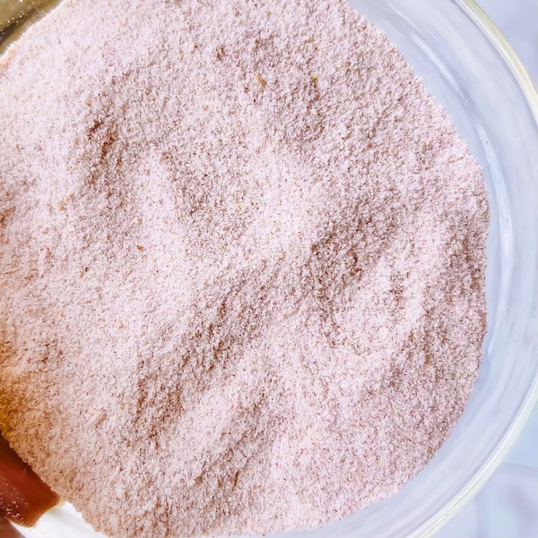Local Ghanaian brown rice flour in a round glass bowl