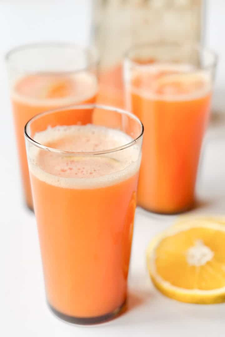 3 glasses of carrot orange juice