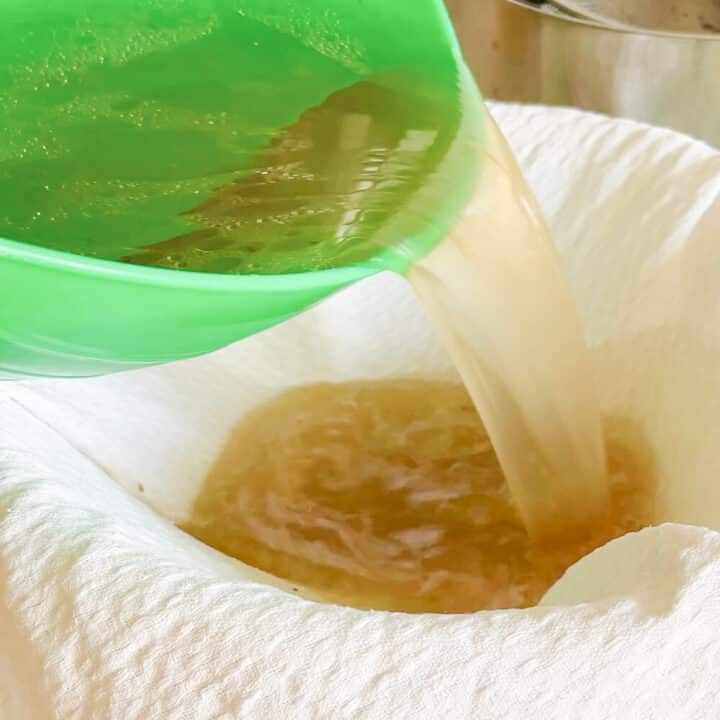 Straining the beef stock.