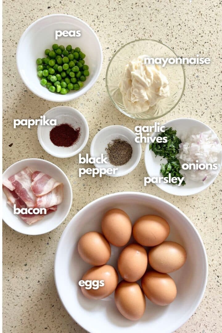 Ingredients for egg salad: peas, eggs, garlic chives, parsley, bacon, mayonnaise, paprika and black pepper.