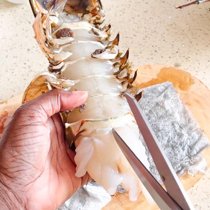 Cutting the belly of the lobster.