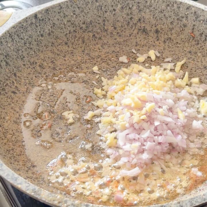 Onions and garlic frying in butter.