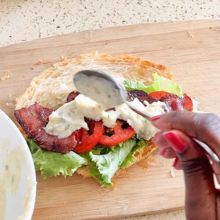 Garlic mayo sauce on sandwich