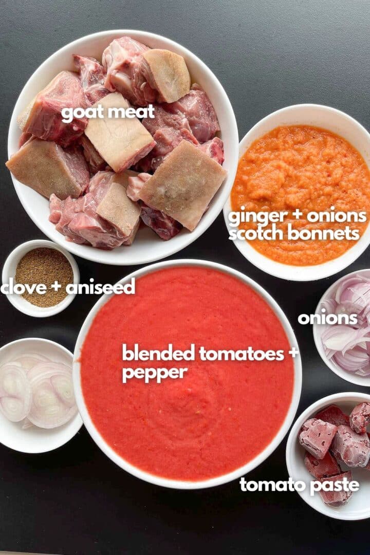 Ingredients for goat meat stew: goat meat, blended tomatoes, blended ginger +onions+scotch bonnets, clover, aniseed and onions.