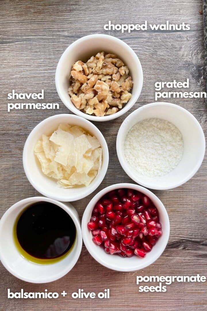 Ingredients for Arugula, walnut and pomegranate salad.
